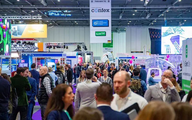 People exploring the exhibition stands at International Confex