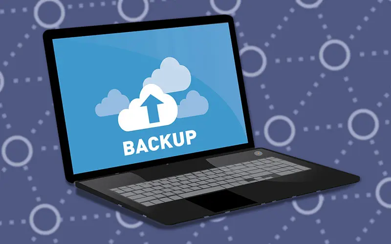 Laptop computer with 'Backup' on the screen
