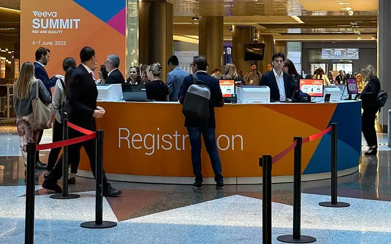 People at a reception desk