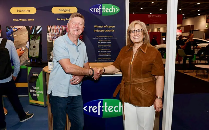 David Preston, CEO of Realise, shaking hands with Margaret Reeves, Managing Director of RefTech