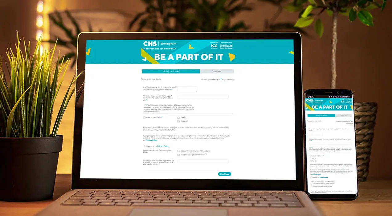 Registration site displayed on laptop and smartphone