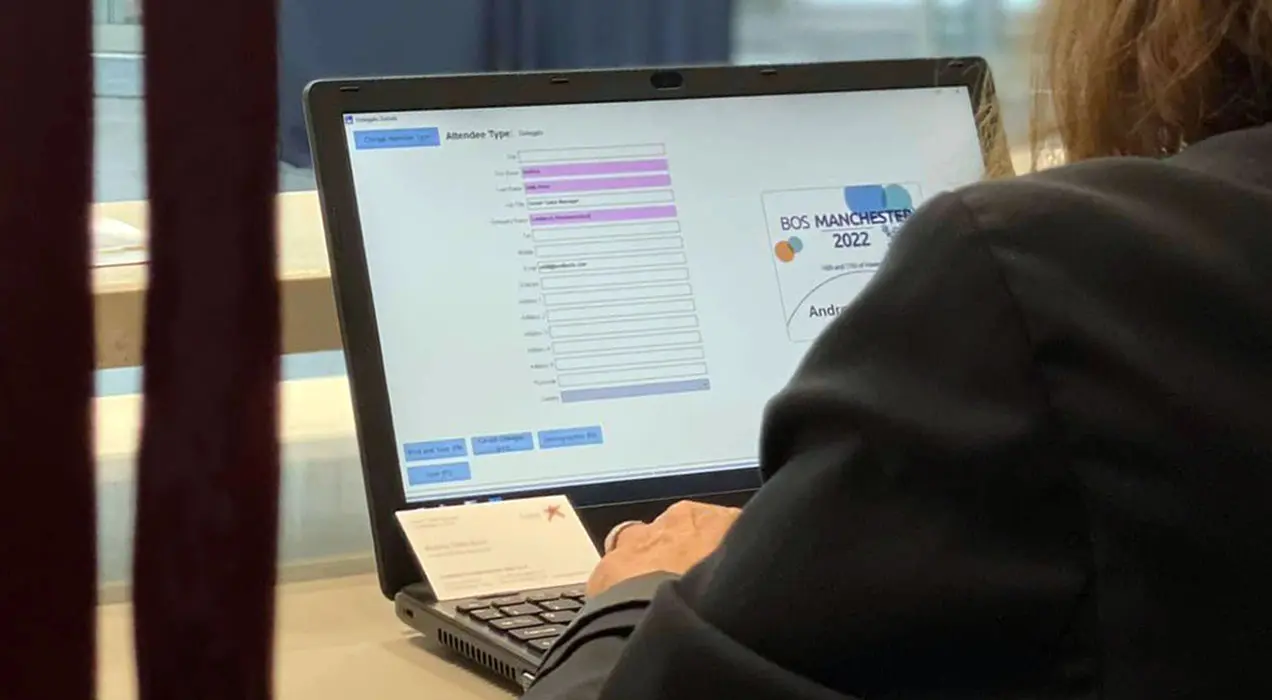 Manned badge station for onsite registration